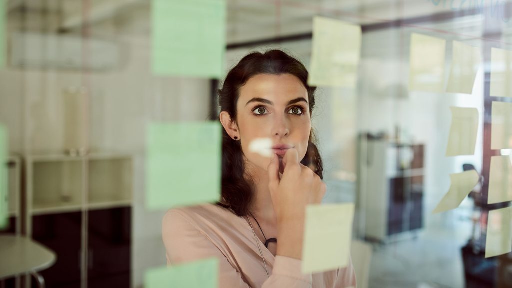 Picture of a women thinking about a better solution.