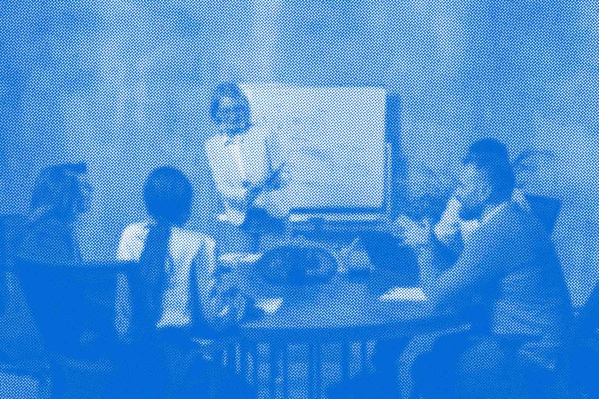 A classroom full of people following an executive sustainability training.
